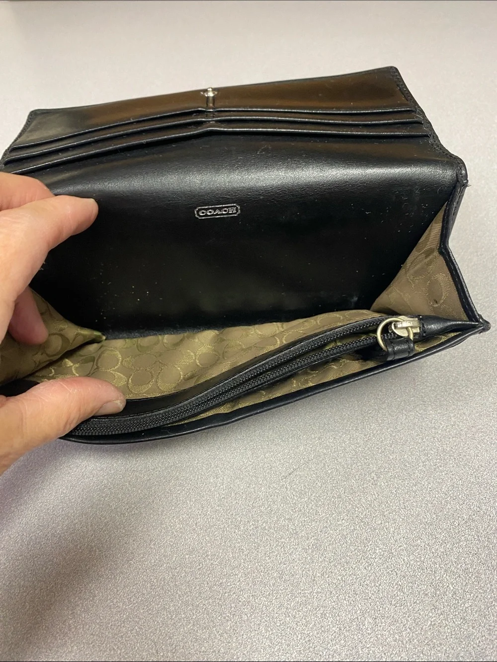 Coach Black Leather Trifold Wallet with Signature Metal Snap